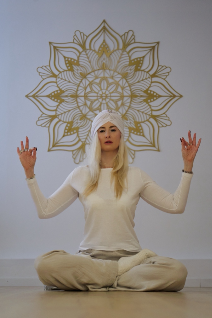 Ksenia Olbut in meditation with sacred mandala